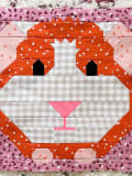 Woollypetals It's All Guinea Be Okay quilt block with orange polka dot fabric