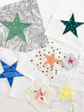 Woollypetals To the Stars FPP Pack featuring colorful fabric stars on white backgrounds