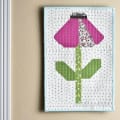 Woollypetals Echinacea Field quilt block with pink flower and green leaves