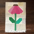 Woollypetals Echinacea Field quilt block in pink and green fabrics