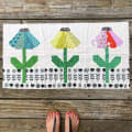 Woollypetals Echinacea Quilt Block with three colorful coneflower blocks