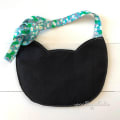 Woollypetals Felt Cat Purse in black with colorful floral fabric strap