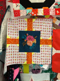 Woollypetals Hearts All Around Quilt with floral center block and heart blocks