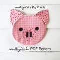Woollypetals Pig Pouch in pink gingham with strawberry print ears