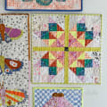 Woollypetals Starfy Mini quilt with colorful sawtooth star design