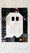 Woollypetals Ghost Party quilt with black, white, and pink fabric blocks