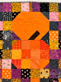 Woollypetals Ghost Party Pumpkin Expansion Pack quilt with orange pumpkin center