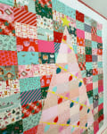 Woollypetals Oh Christmas Tree quilt showing colorful patchwork blocks in progress
