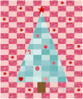 Woollypetals Oh Christmas Tree quilt with festive red stars and ornaments
