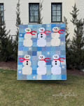 Woollypetals Do You Want to Sew a Snowman Quilt displayed outdoors