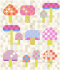 Woollypetals Capped quilt pattern with colorful mushroom blocks
