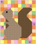 Woollypetals Squirrel quilt in colorful patchwork with brown center design