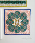 Woollypetals StarPetals Mini Quilt with green floral petals and star center