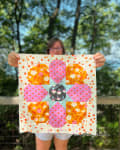 Woollypetals StarPetals Mini Quilt with orange and pink fabric blocks
