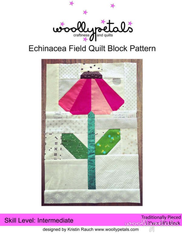 Woollypetals Echinacea Field quilt with colorful flower and butterfly appliqués on dark background