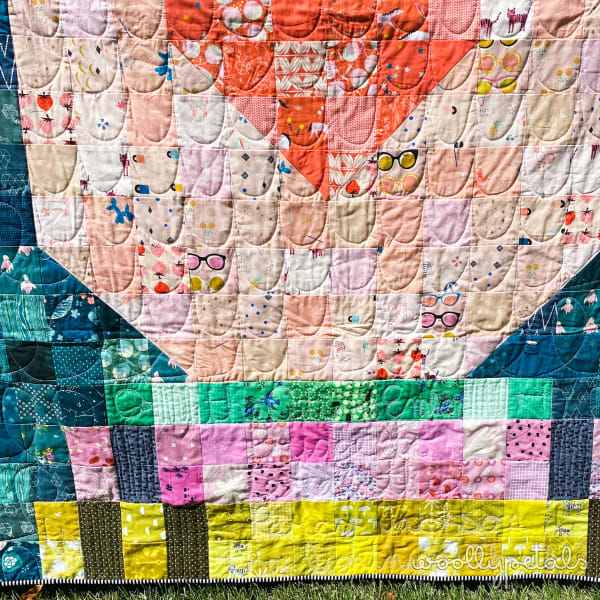 Woollypetals Book Date Patchwork Quilt with colorful fabric squares