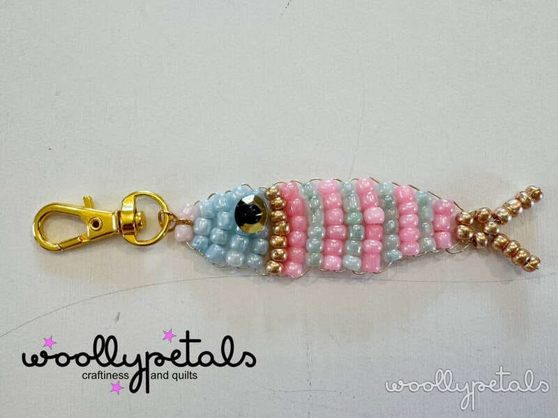 Woollypetals Beaded Sardine Charm with pink and blue beads and gold clasp