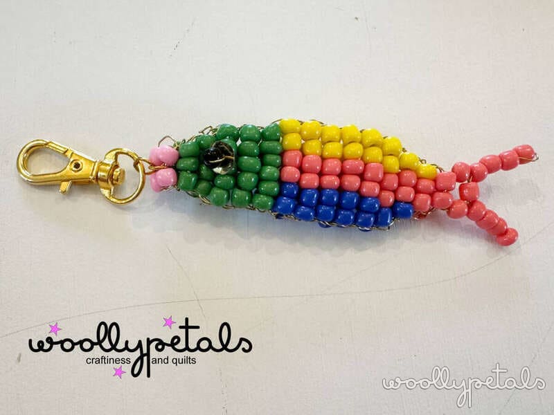 Beaded Sardine Charm with colorful beads and gold lobster claw clasp