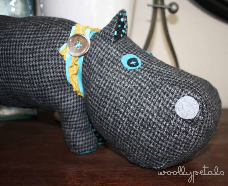 Chicken Pincushion in gray fabric with decorative details