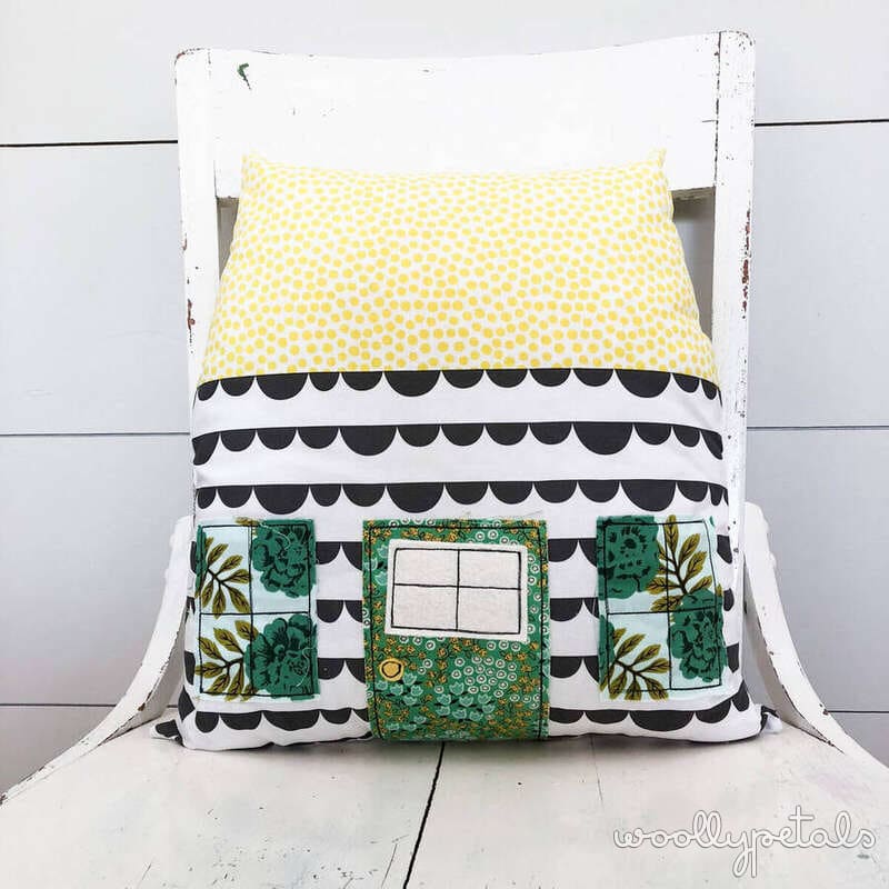 Silly Goose pattern pillow with yellow polka dot and black scallop designs