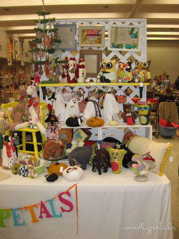 Mini dollhouse craft display with colorful decorations and accessories