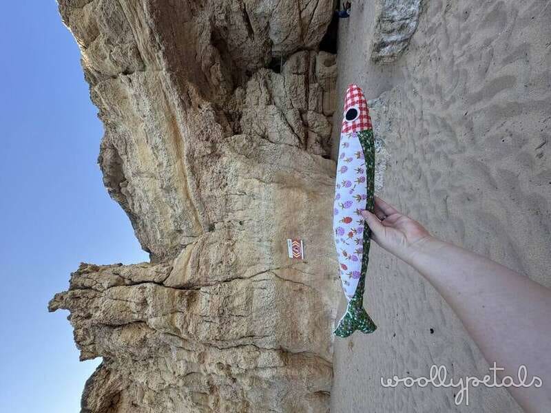 FPP Sardine Tin pattern held up against stone wall in Portugal