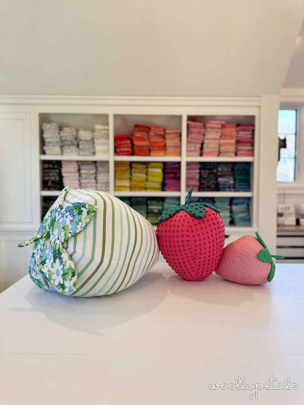 Woollypetals Strawberry Friends pillows in red and pink fabrics