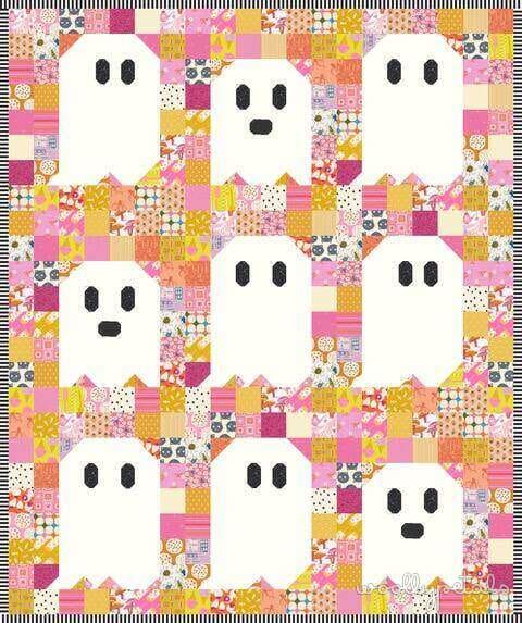 Woollypetals Ghost Party quilt with white ghost blocks on colorful patchwork background