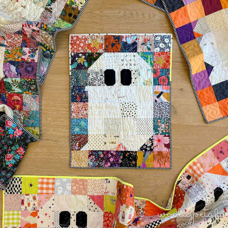 Woollypetals Ghost Party quilt with patchwork ghost face design