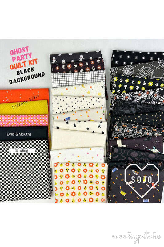 Ghost Party quilt kit with black background fabrics and Halloween prints