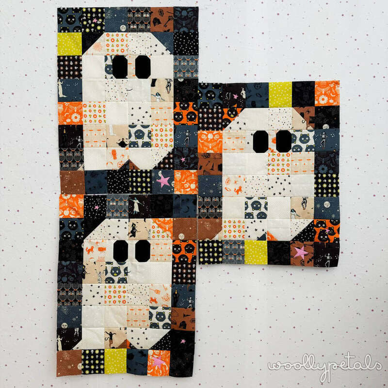 Woollypetals Ghost Party quilt with colorful patchwork blocks and ghost shapes