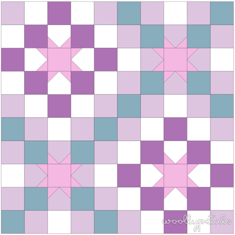 Woollypetals New Star Quilt in pink, purple, and teal fabrics