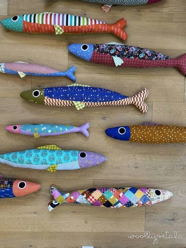 Woollypetals Sardine Pillow pattern in various colorful fabric combinations