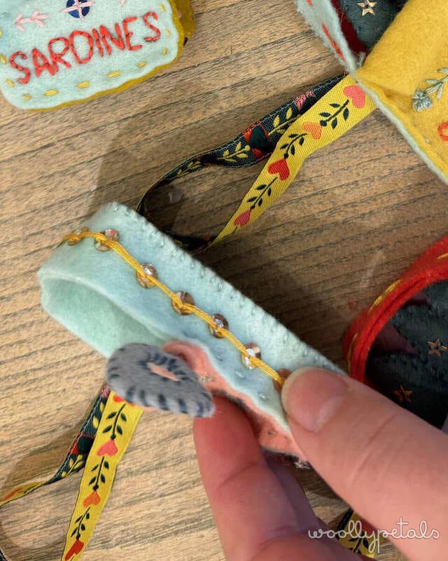 Woollypetals Sardine Tin Ornament Tutorial showing hand-sewn felt sardines with embroidered details