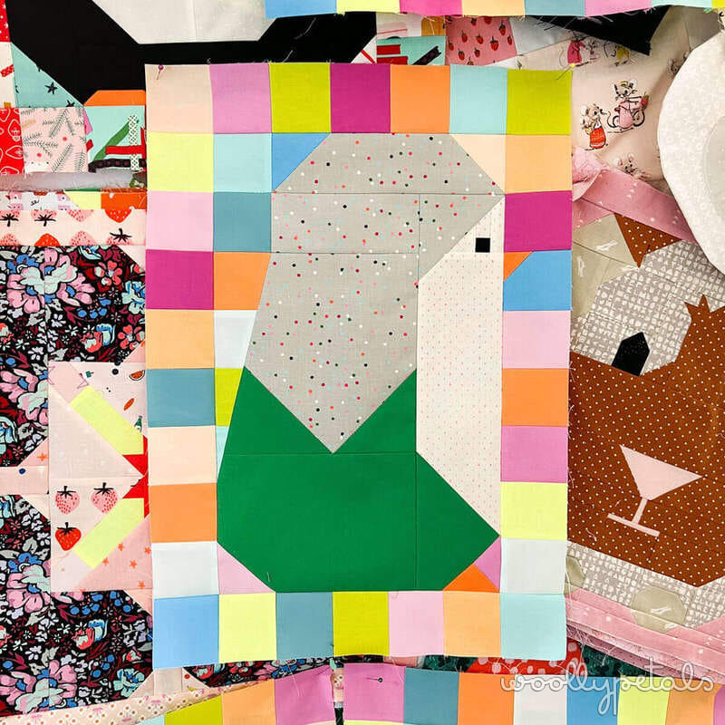 Colorful patchwork quilt block demonstrating scant 1/4 inch seam allowance technique