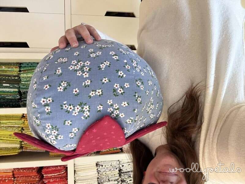 Woollypetals Strawberry Pillow with blue floral fabric and red leaf detail