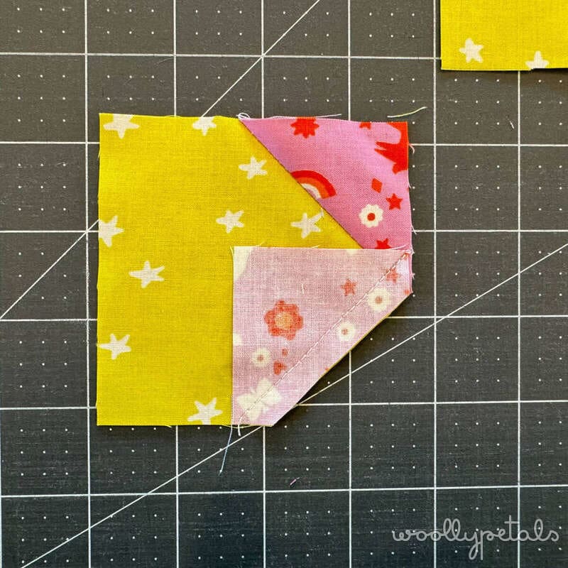 Woollypetals New Star Beginner Quilt Course Stitch'N'Flip technique demonstration on cutting mat