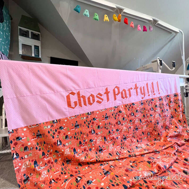 Ghost Party quilt backing with pink and orange Halloween-themed fabrics