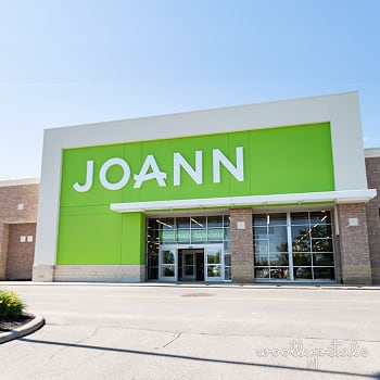 Joann Fabrics storefront with bright green signage