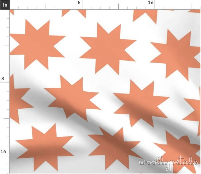 Woollypetals Sawtooth Star fabric in coral on twill with geometric star pattern