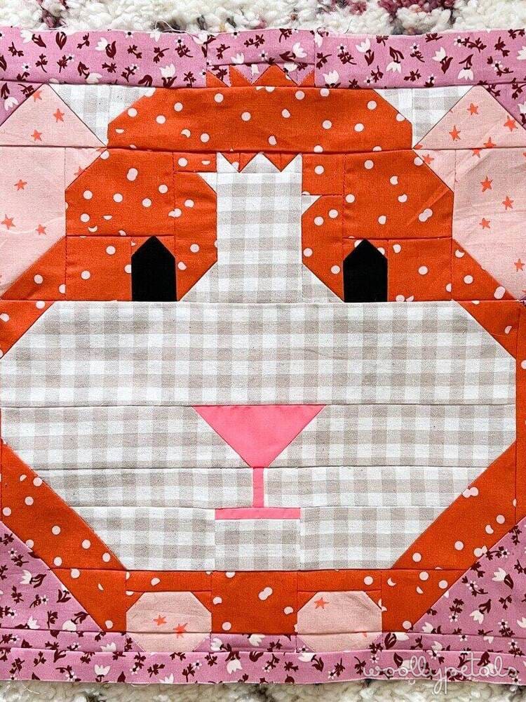 Woollypetals It's All Guinea Be Okay quilt block with orange polka dot fabric