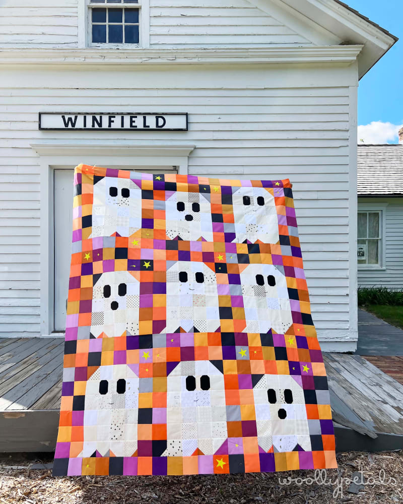 Woollypetals Ghost Party quilt displayed on Winfield building exterior