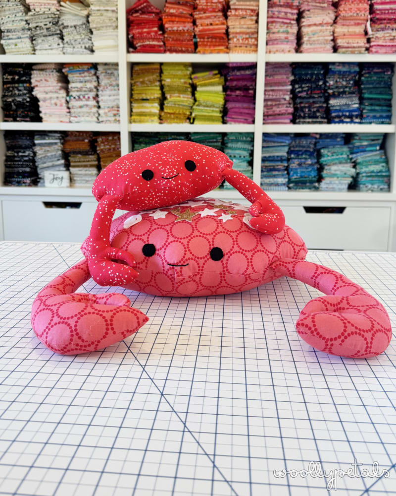 Woollypetals Coco the Crab sewing pattern in red and pink fabrics